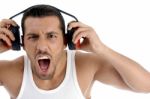 Caucasian Guy Enjoying Rock Music With Full Volume Stock Photo