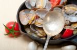 Fresh Clams On An Iron Skillet Stock Photo