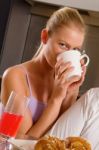 Woman Having Breakfast Stock Photo