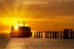 Ferry Boat At Sunset Stock Photo