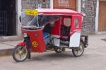 Red Motorcycle Taxi Stock Photo