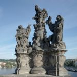 Statue Of Saints Dominic And Thomas On Charles Bridge In Prague Stock Photo