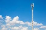 Communication Antenna Repeater Tower On Blue Sky Background Stock Photo