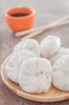 Chinese Leek Steamed Dessert On Wooden Table Stock Photo