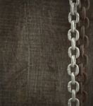 Rusty Chain And Wood Background Stock Photo