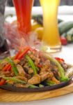 Original Fajita Sizzling Hot  On Iron Plate Stock Photo