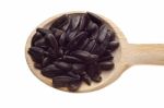 Sunflower Seeds On Wooden Spoon Stock Photo