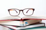 Glasses On Stack Of Books Stock Photo