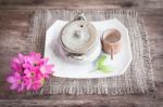 Tea Cups With Teapot On Old Wooden Table Stock Photo