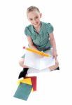 Sitting Schoolgirl Writing In Note Stock Photo