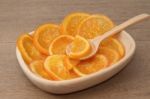 Dehydrated Dried Orange In Wooden Bowl Stock Photo