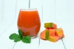 Fresh Tropical Papaya Juice Isolated On A White Background Stock Photo