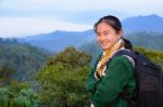 Tourist Girl On The Mountain Stock Photo