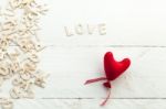 Scattered Wooden Letters And A Red Heart Stock Photo