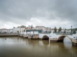 Tavira, Southern Algarve/portugal - March 8 : Bridge Over The Ri Stock Photo