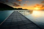 The Beautiful Wooden Bridge With Sunrise At National Park Stock Photo