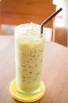 Glass Of Iced Green Tea Latte Stock Photo