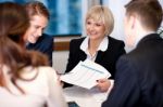 Company Discussion Going On In A Meeting Hall Stock Photo