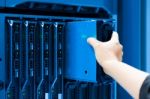 Man Fix Server Network In Data Center Room Stock Photo