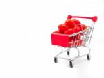 Fresh Grape Or Cherry Tomato In Trolly On White Background Stock Photo