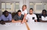 Language Training For Refugees In A German Camp Stock Photo