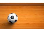 A Ball On Wooden Floor Stock Photo