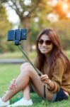 Women Hold Monopod Use Smart Phone Take Selfie Photography Stock Photo