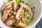 Green Noodle And Dumpling With Roasted Pork Stock Photo