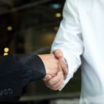 Two Businessman Shaking Hands Stock Photo