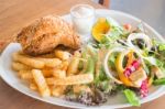 Deep Fried Chicken Meat With Organic Salad Stock Photo