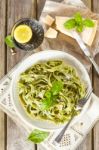 Homemade Spinach Pasta With Pesto And Parmesan Cheese Stock Photo