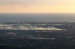 Horizon View Coastline With Smoke From Fire Stock Photo