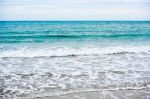 Sand Beach With Blue Ocean Stock Photo