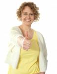 Woman Posing With Thumbs Up Stock Photo