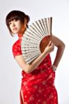 Chinese Model In Traditional Cheongsam Dress Stock Photo