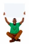 African Male Holding Blank Board Stock Photo