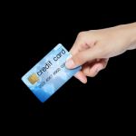 Hand Holding Credit Card Stock Photo