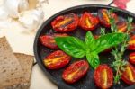 Baked Cherry Tomatoes With Basil And Thyme Stock Photo