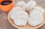 Chinese Leek Steamed Dessert On Wooden Table Stock Photo