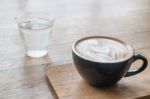 Hot Cup Of Coffee On Wooden Table Stock Photo