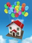 House With Balloon In The Sky Stock Photo