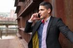 Portrait Of A Young Man With Talking On The Phone Stock Photo