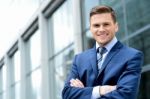 Young Businessman Smiling In A Office Outdoor Stock Photo