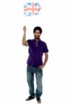 Causal Guy Waving United Kingdom Flag Stock Photo