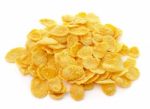 Sweet, Tasty Cornflakes, Dry Crispy On White Background Stock Photo