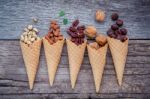 Concept For Homemade Various Nuts Ice Cream. Mixed Nuts In Waffl Stock Photo