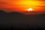 Sunset Over Mountain Range Stock Photo