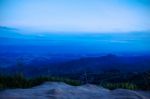 Stone Overlooking On Mountains With The Sky Stock Photo