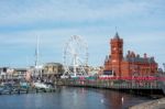 Cardiff/uk - August 27 : Ferris Wheel And Pierhead Building In C Stock Photo