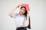 Asia Thai High School Student Uniform Beautiful Girl Read A Book Stock Photo